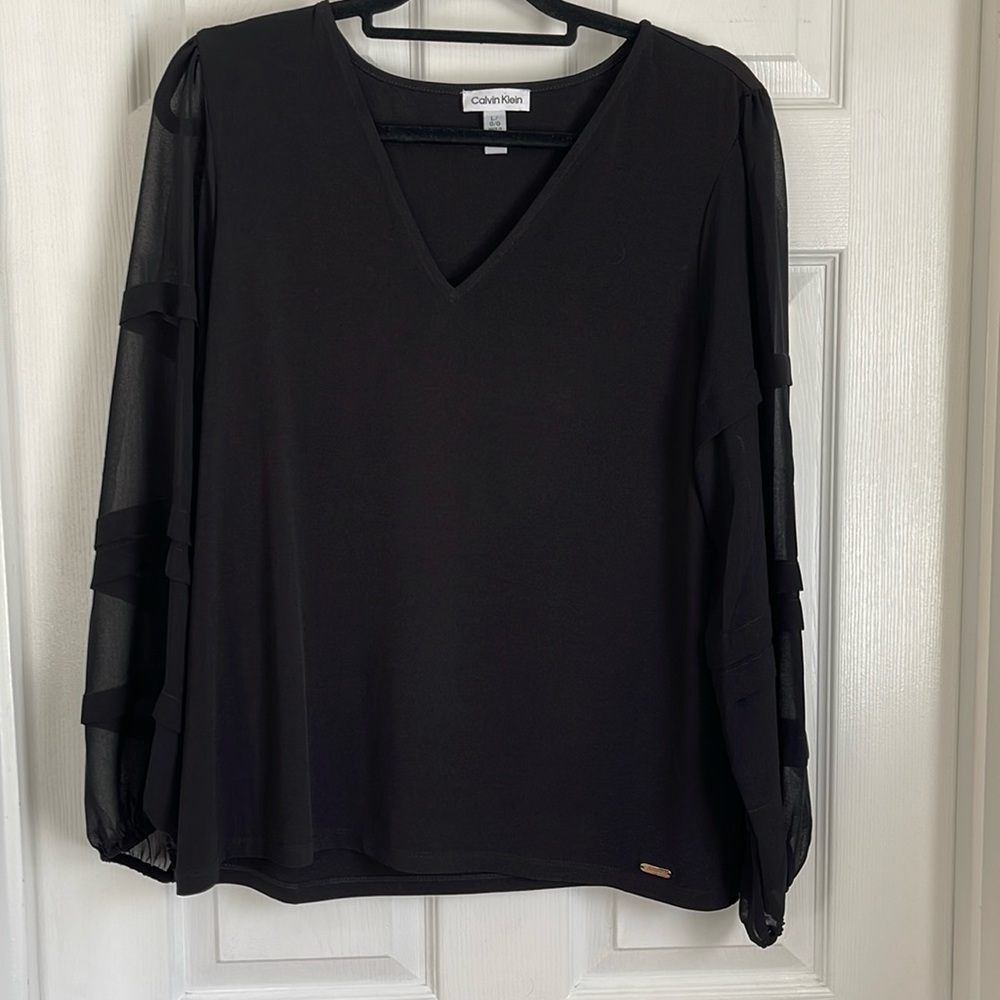 Calvin Klein V Neck Top 
Perfect for Holidays
See thru Bell Sleeve w/elastic end